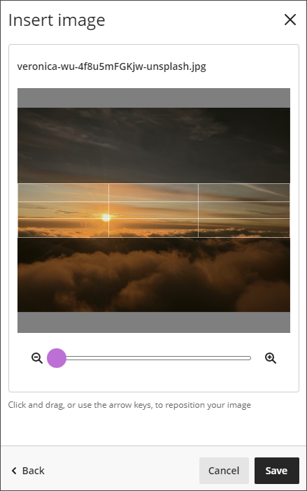 The Insert Image window, showing a slider with a purple dot below the preview of clouds